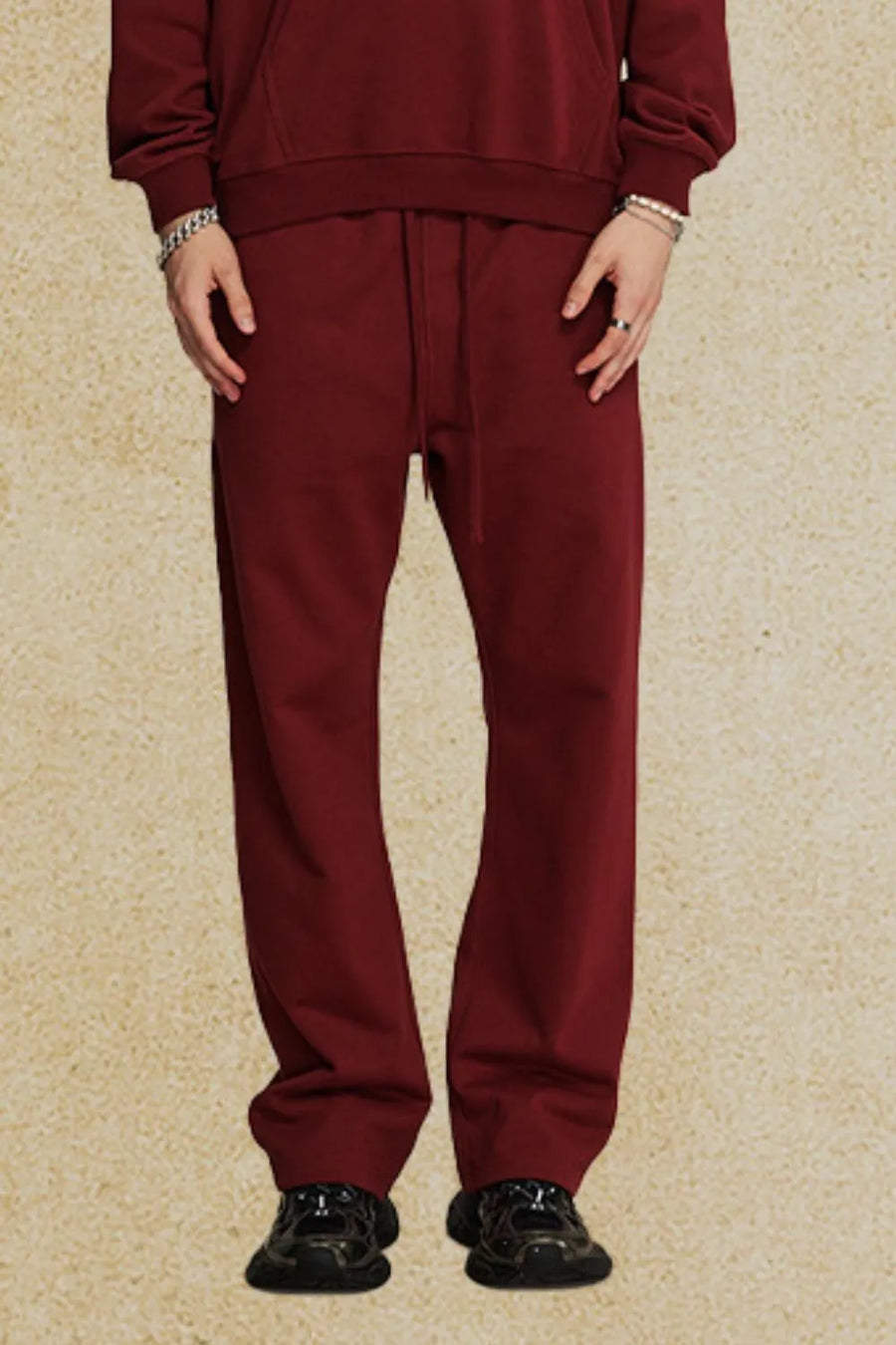 Burgundy relaxed fit lounge trousers with drawstring waist and straight leg