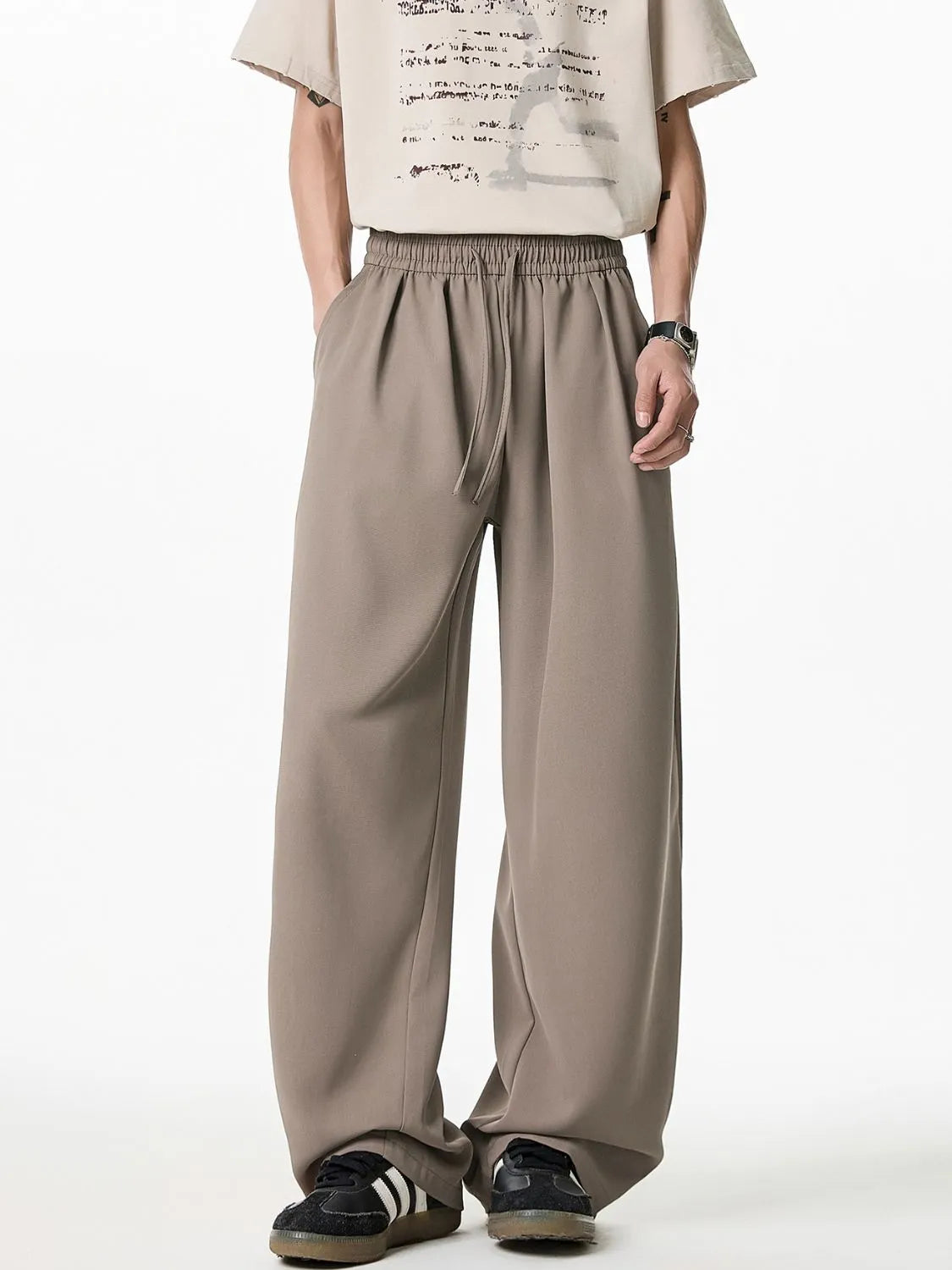 Relaxed taupe palazzo trousers with drawstring waist and wide leg