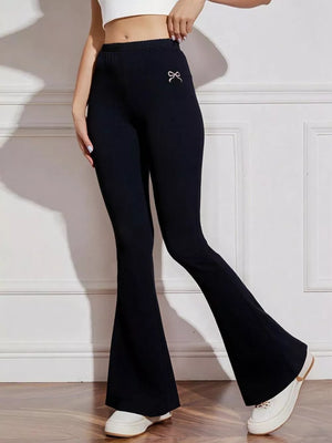 Black flared high-waist active pants with bow emblem detail