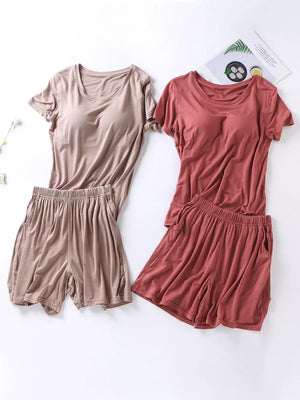 Two-piece pajama set with short sleeves and shorts in Milk Tea Camel and Windsor Red, featuring pockets and elastic