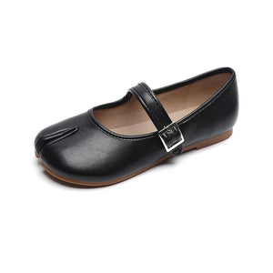 Black tabi Mary Jane flats with a single strap and silver buckle detail.