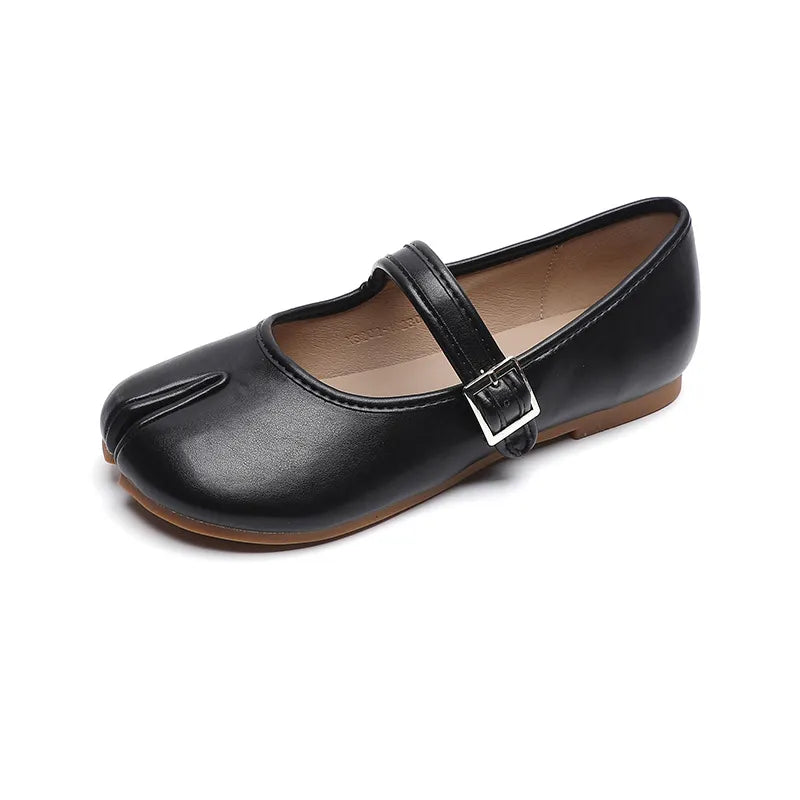 Black tabi Mary Jane flats with a single strap and silver buckle detail.