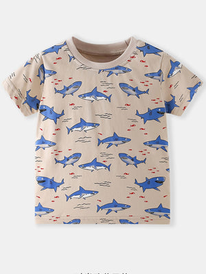 Toddler crew neck t-shirt with all-over blue shark print on beige fabric.