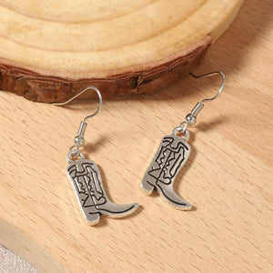 Style B earrings featuring dangle and figurative