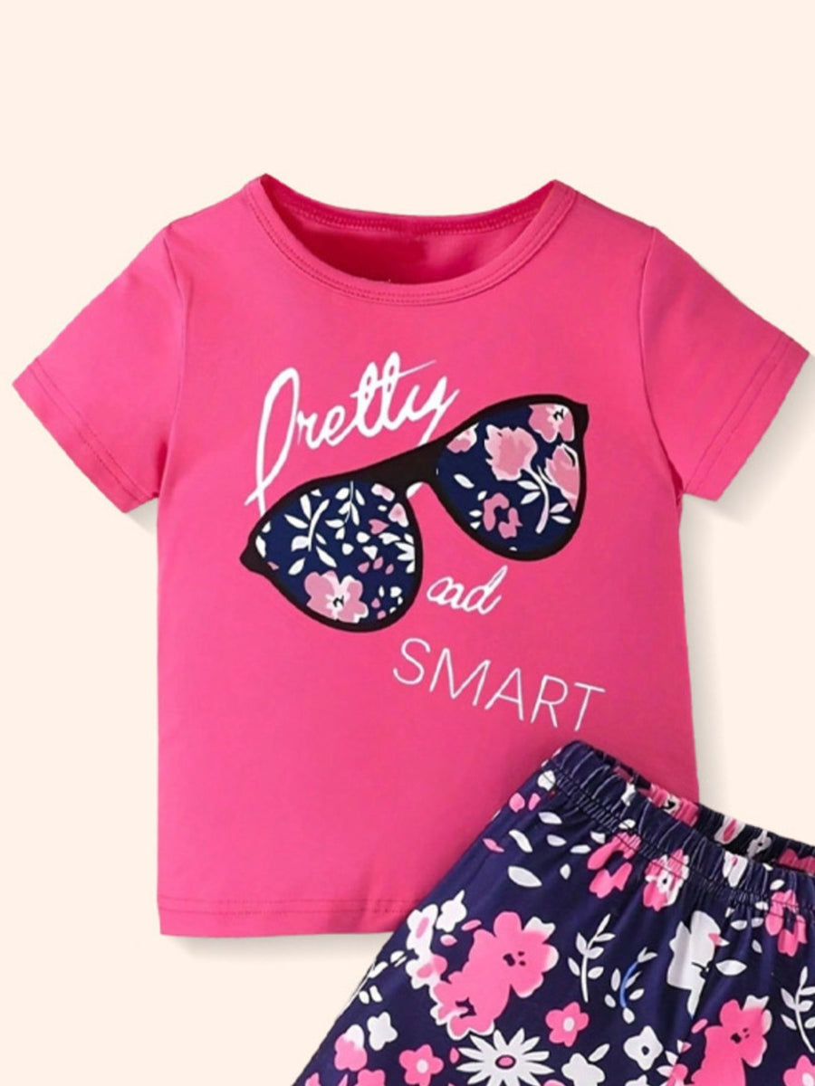 Pink graphic tee with sunglasses and floral shorts set for baby girls.