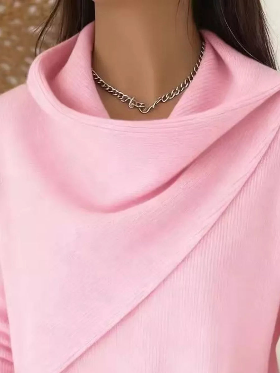 100% polyester Care instructions: Machine wash cold pullover sweater in Pink with relaxed silhouette