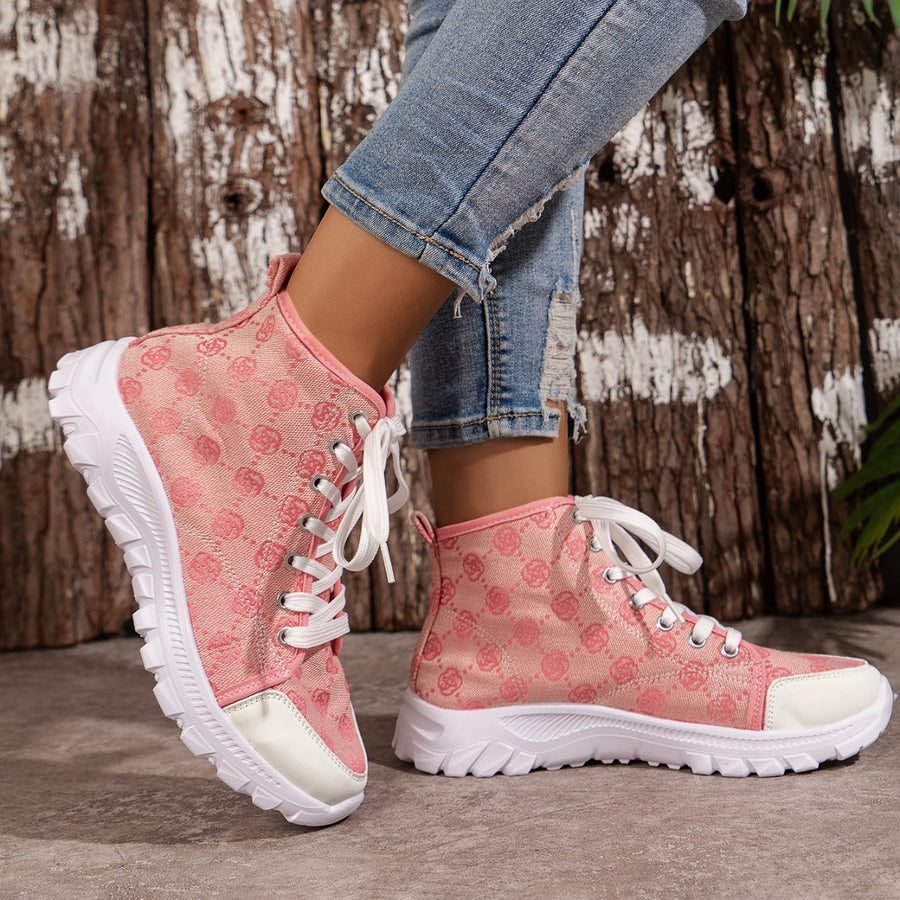 Pink lace-up high-top canvas sneakers with a subtle all-over pattern and white chunky sole.