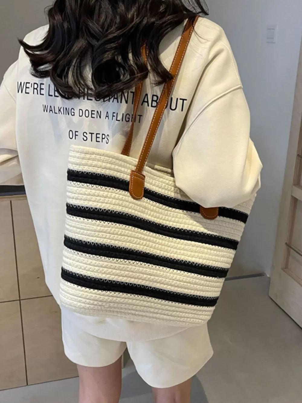 tote featuring striped in black with Polyester Imported Size &amp texture