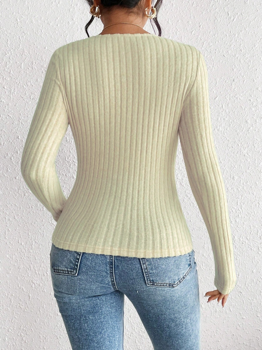 Ribbed long sleeve bodysuit in khaki with sweetheart neckline.