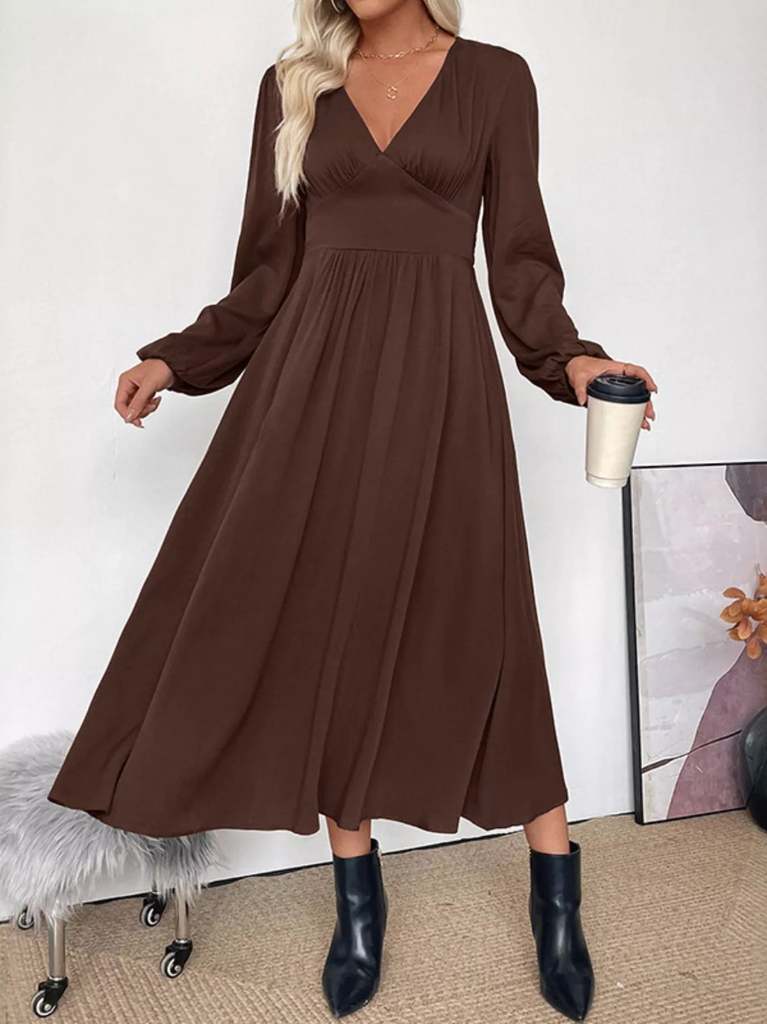 Brown V-neck midi dress with puff sleeves and A-line skirt