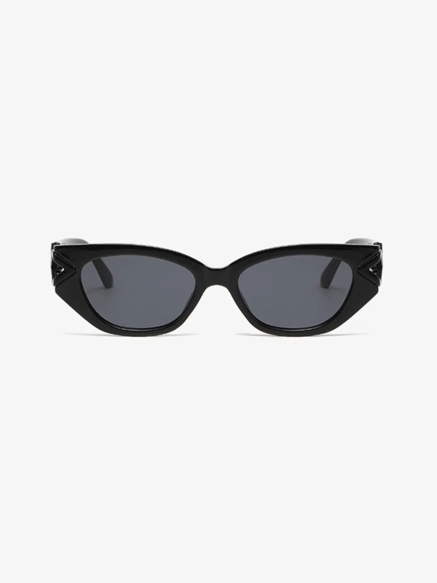 Black cat-eye sunglasses with geometric temple accents and dark lenses.