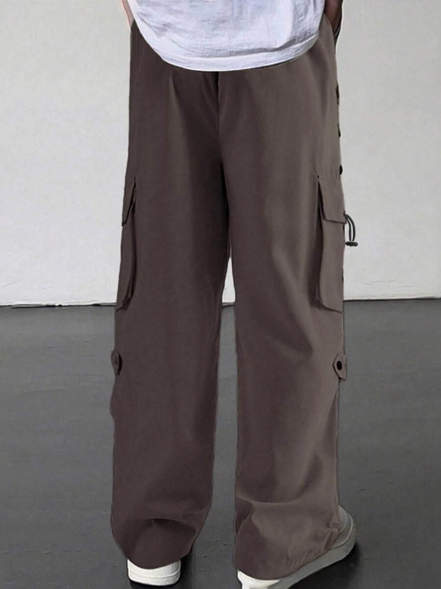 Brown cargo pants with multiple pockets and drawstring details.