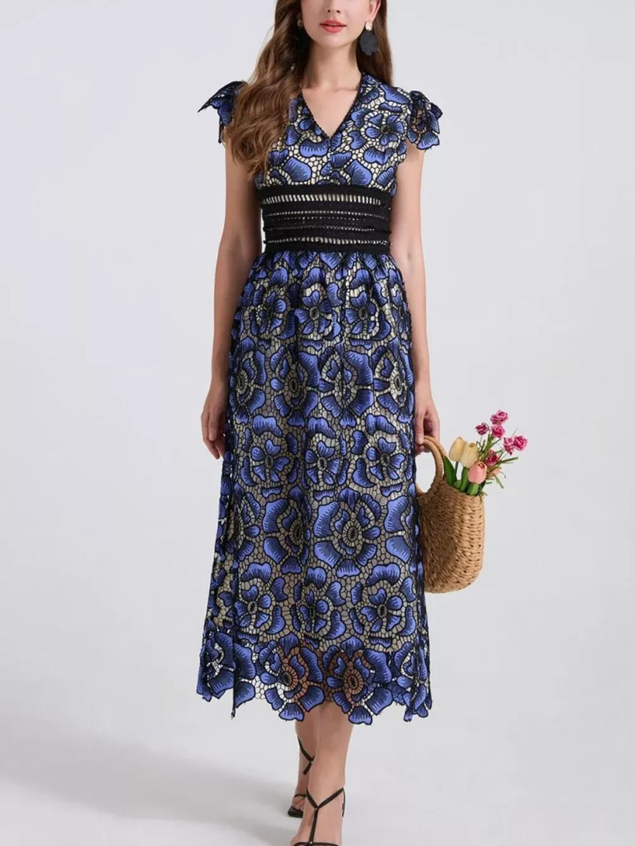 Blue floral lace midi dress with V-neck, cap sleeves, and black waistband.