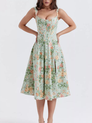 Floral midi dress in sage with a side slit and sweetheart neckline.