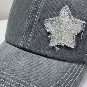 Gray baseball cap with distressed glitter star detail and white stitching.