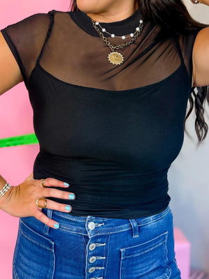 Black sheer mesh cap sleeve t-shirt with a scoop neck cami underneath.