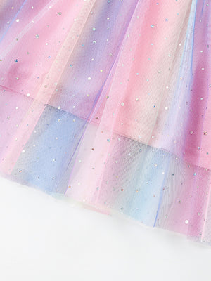 Unicorn dress with rainbow ombre tulle and glitter accents.