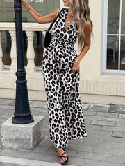 Sleeveless leopard print romper with V-neck and belted waist.