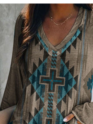 Grey long sleeve v-neck t-shirt with geometric pattern and cross detail