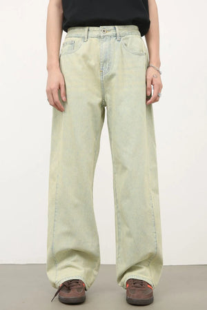 Acid wash wide leg denim trousers in sage green, featuring a relaxed fit and casual styling.