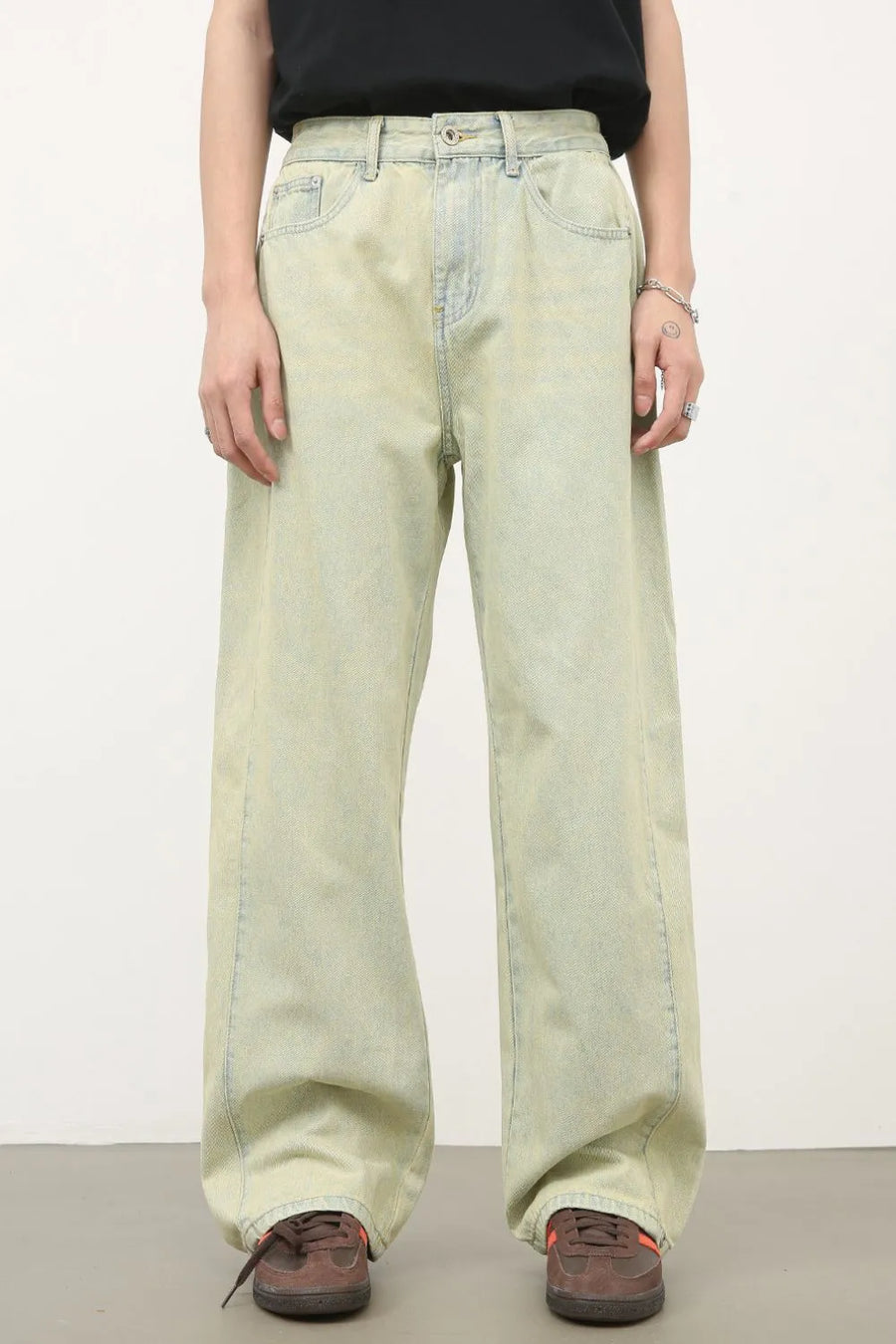 Acid wash wide leg denim trousers in sage green, featuring a relaxed fit and casual styling.