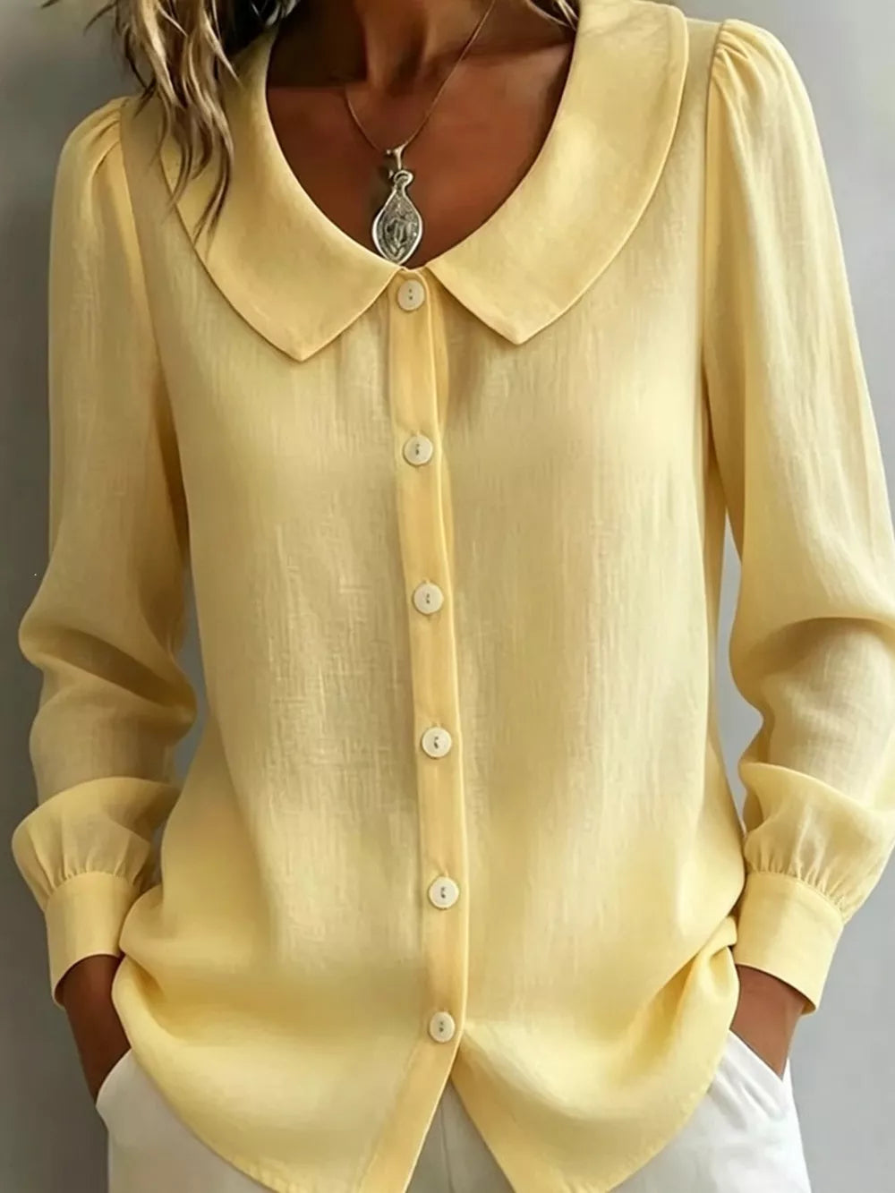 button-down shirt in Black with buttoned and hip-length