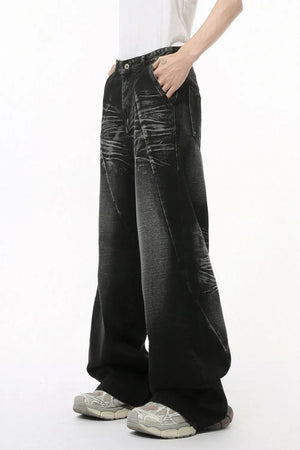 Dark wash wide leg denim jeans with sculpted details and a relaxed fit.
