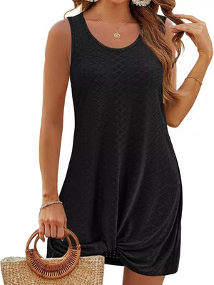 Black eyelet tank dress with twisted hem detail.