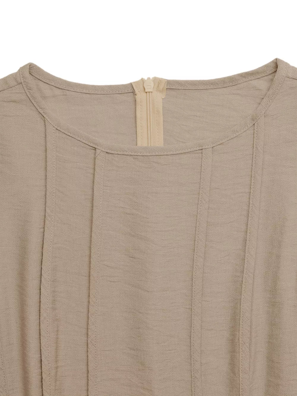 Textured beige maxi dress with elegant silhouette, featuring a round neckline and front zipper detail.
