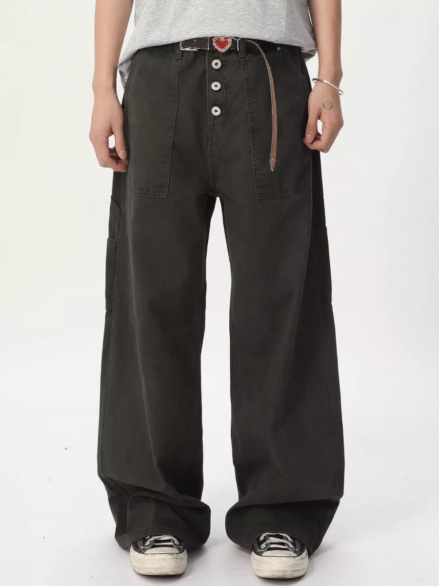 Relaxed wide-leg cargo pants in gray cotton with button fly and large front pockets.