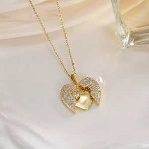 18K Gold-Plated,Titanium Steel,Rhinestone Care instructions: Avoid wearing durin necklace in clear with heart silhouette