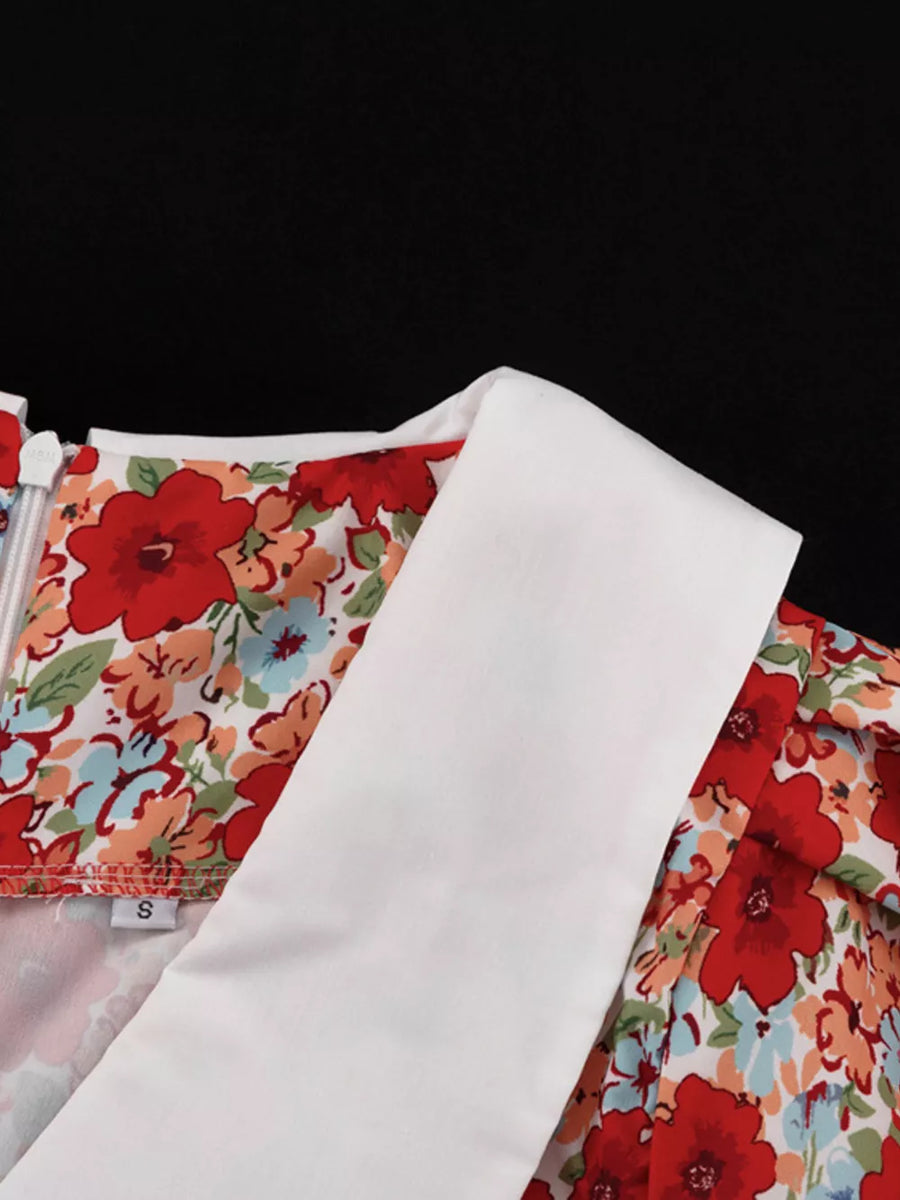 Floral print dress with white collar and zipper detail