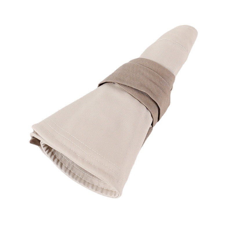 Elegant wide brim sun visor hat in khaki with a taupe band detail.