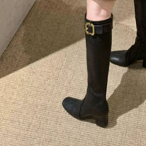 Black boots with knee-length and side-zip