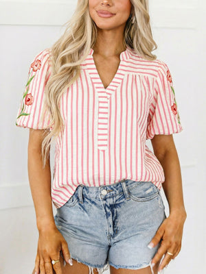 Pink striped blouse with floral embroidered puff sleeves and split neckline