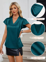 Teal satin V-neck blouse with flutter sleeves and subtle pleating detail.