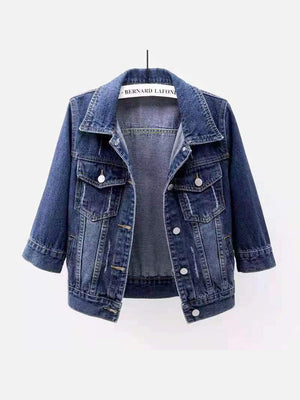 denim jacket in medium wash denim blue featuring washed and regular fit