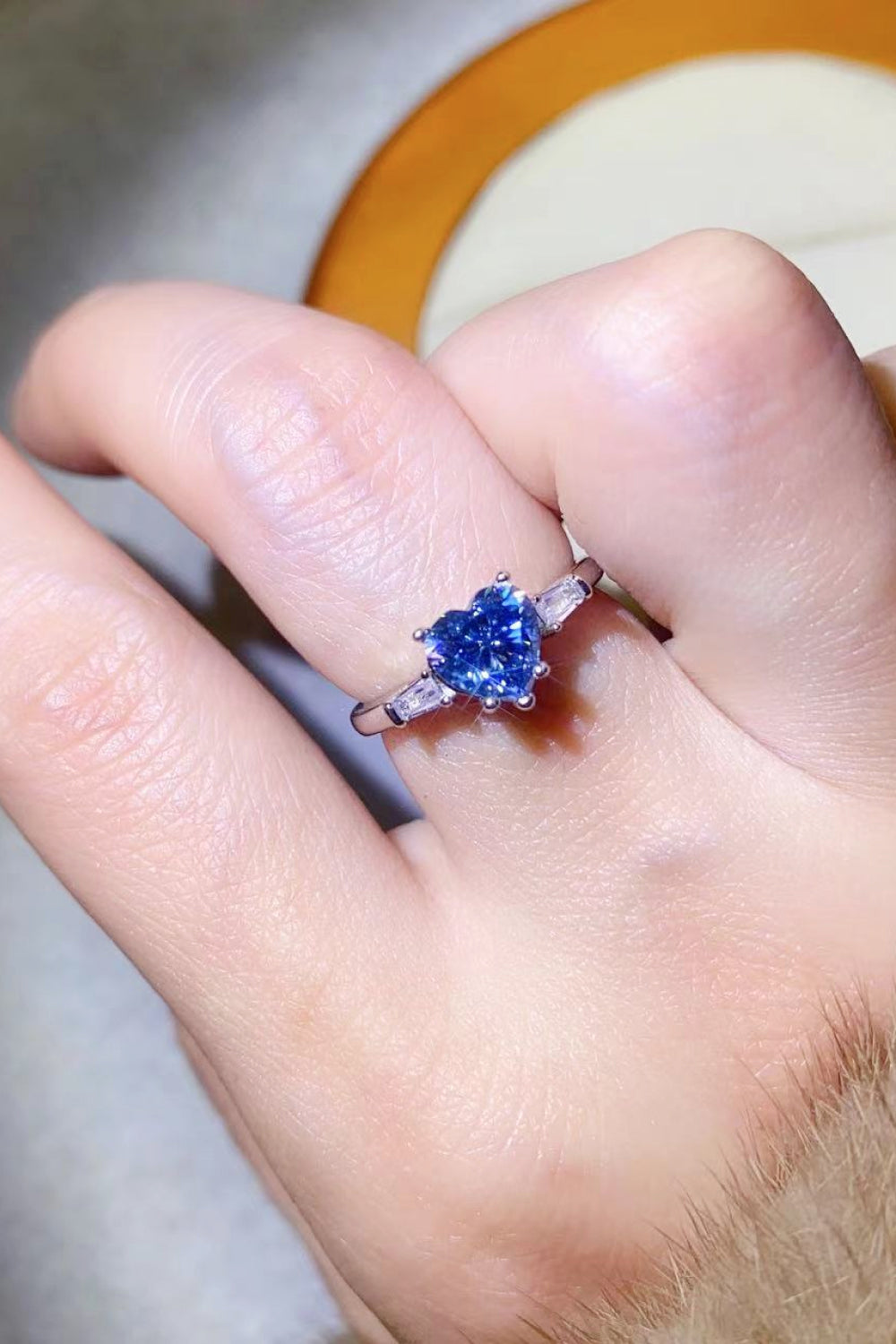 Blue heart sapphire ring in sterling silver with accent stones