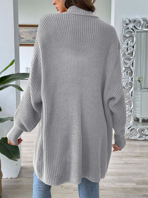 Gray ribbed knit cocoon cardigan with a relaxed fit and balloon sleeves.