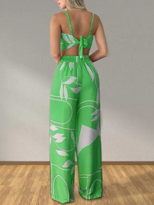 Light green tropical print crop top and wide-leg pants set with tie back detail.