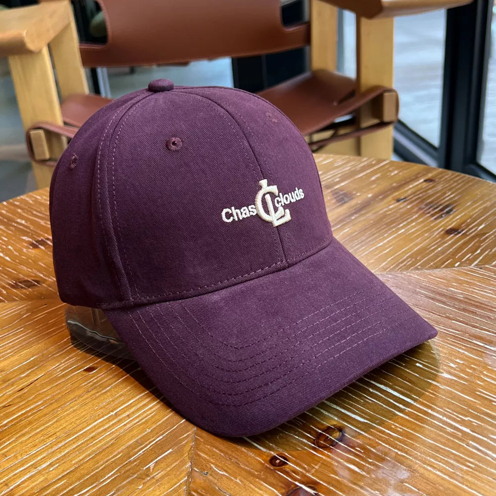 Baseball cap in plum with embroidered logo