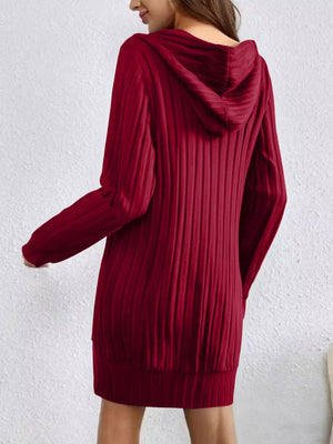 Women's red ribbed knit hoodie dress with long sleeves and a relaxed fit.