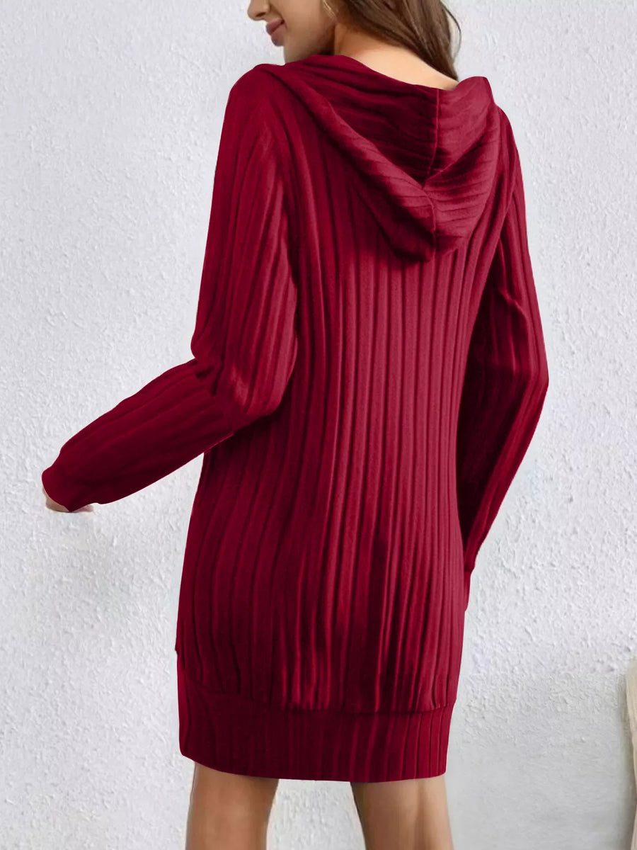 Women's red ribbed knit hoodie dress with long sleeves and a relaxed fit.