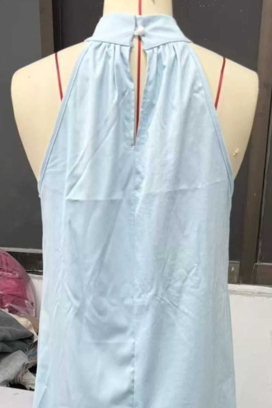 Light blue cotton blend maxi dress with halter neckline and back keyhole detail.