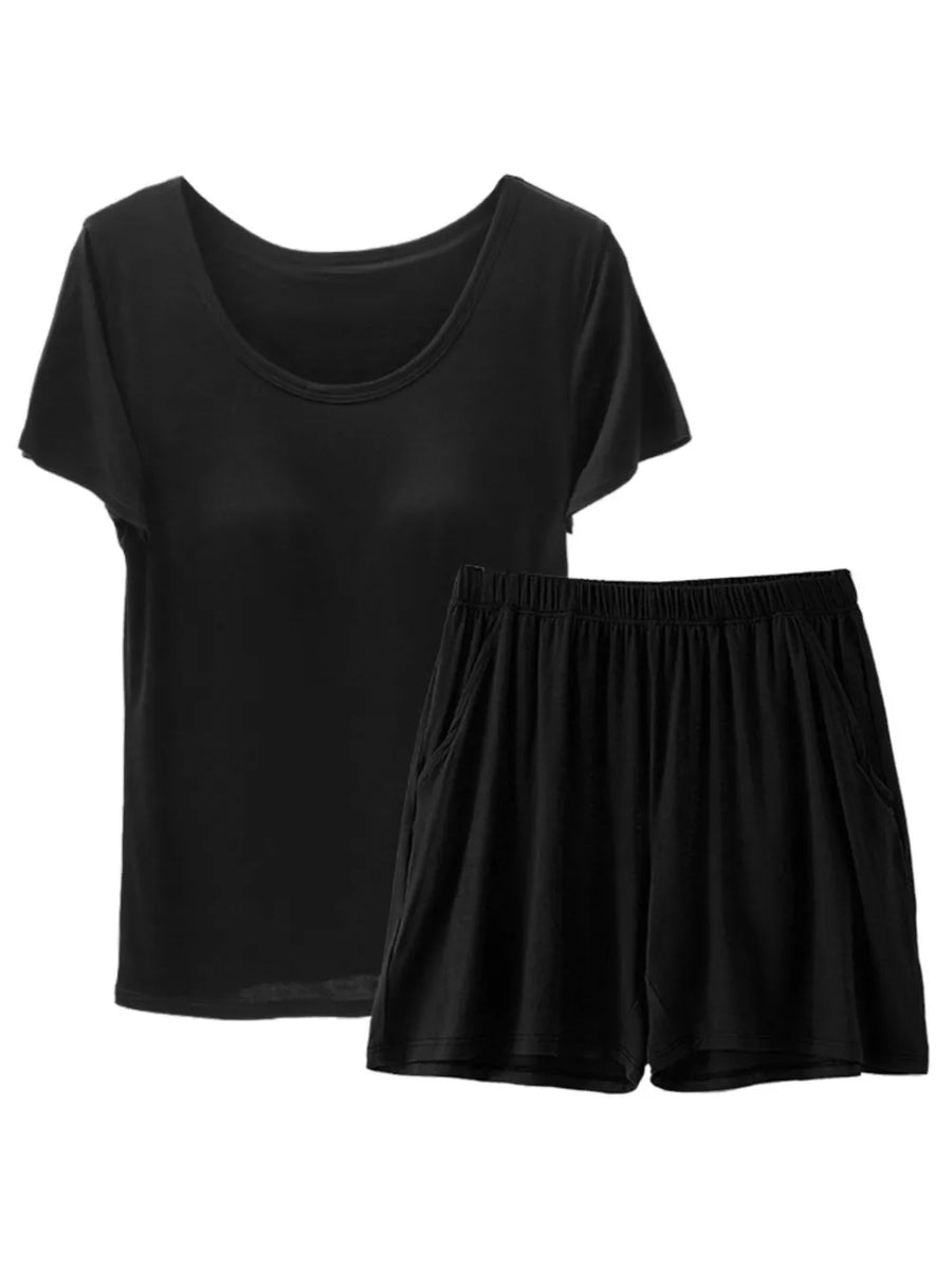Black short sleeve pajama set with scoop neck top and elastic waist shorts with pockets.