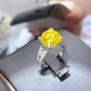 ring in yellow featuring 5 carat moissanite and fitted fit