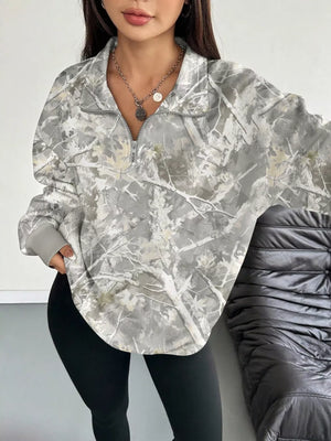light gray sweatshirt with camo and collared