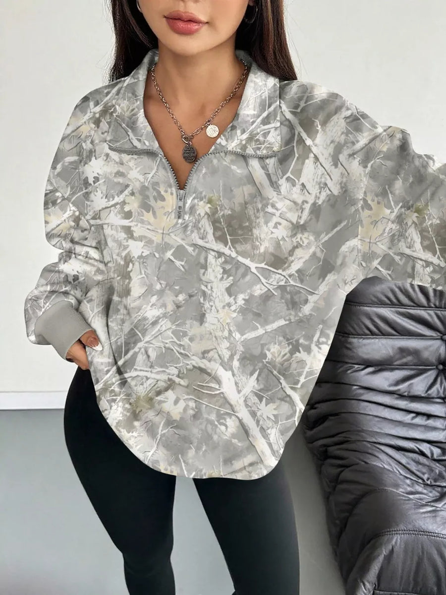 light gray sweatshirt with camo and collared