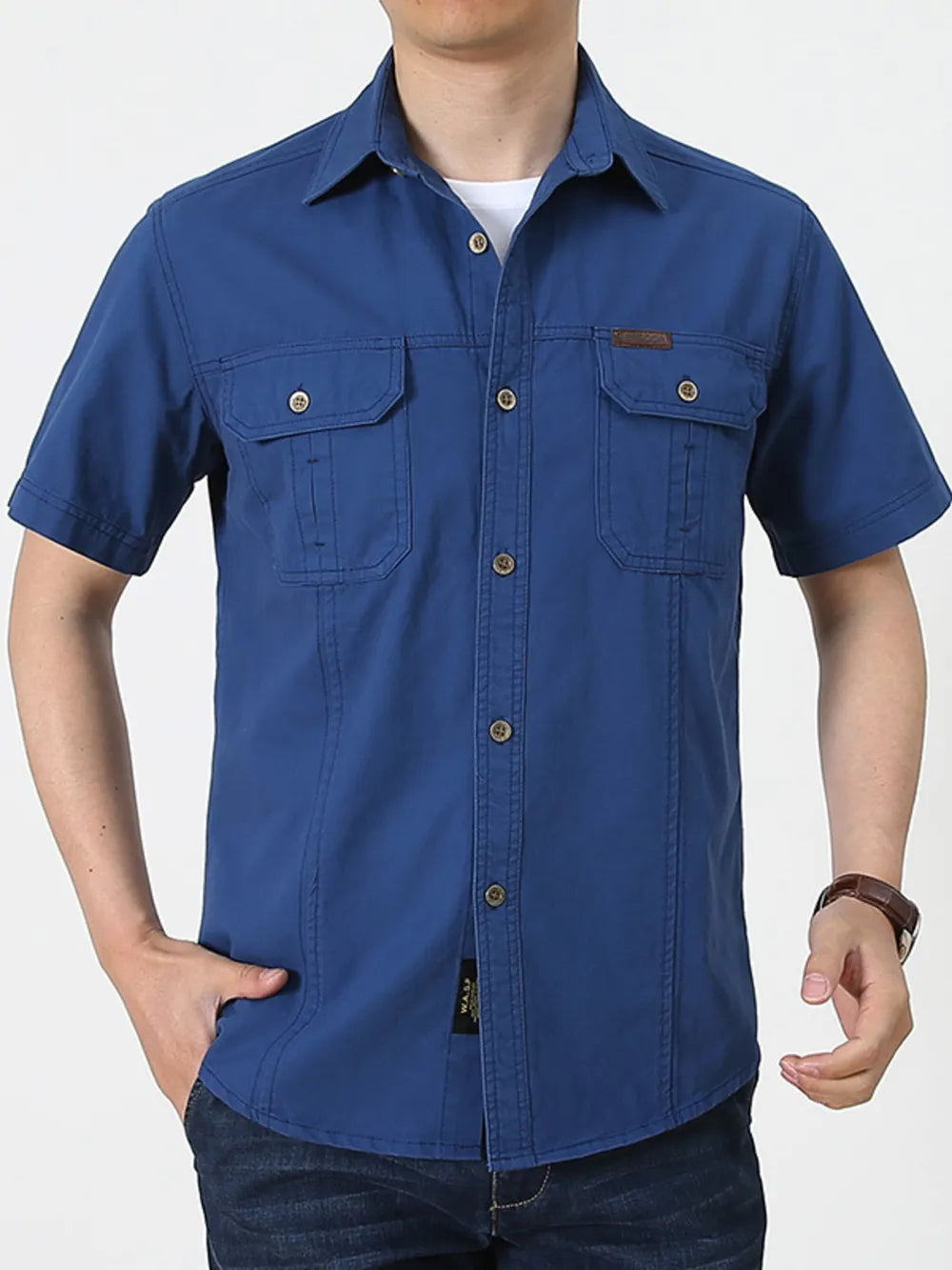 Men's short sleeve denim blue casual shirt with two chest pockets and button closure.