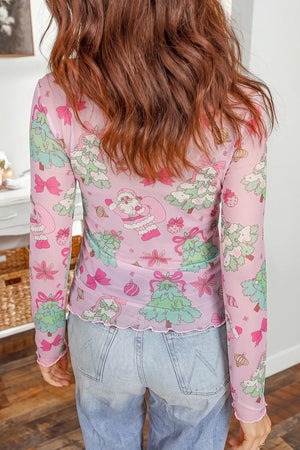 light green long sleeve top featuring mesh and novelty print